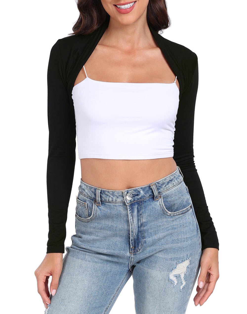 Model wearing a black open-front cropped shrug over a white cami